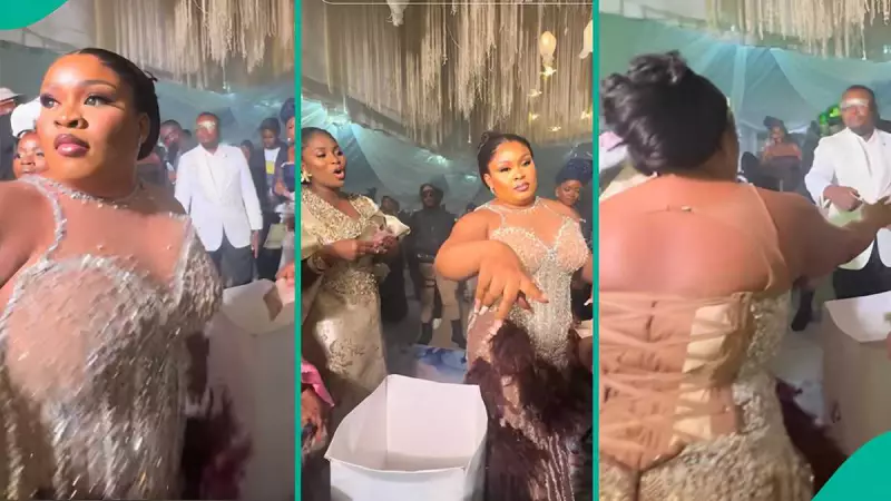 Nigerian Bride's Lightning Reflexes Foil Wedding Guest Attempting to Steal Sprayed Money | Legit.ng