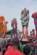 Aba Traders Carry Mannequins on Heads for Better Sales Visibility