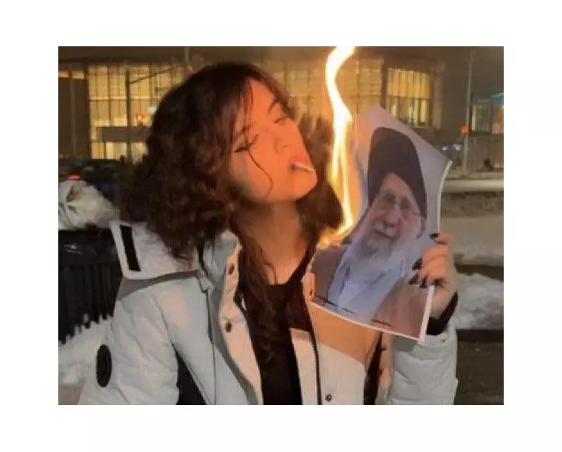 Iranian Women Defy Regime, Light Cigarettes with Burning Photo of Supreme Leader