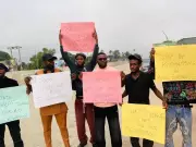 Ekpoma Erupts in Protest Over Kidnappings, Campaign Billboards Torn Down