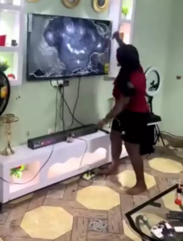 Ghanaian Woman Destroys Boyfriend's TV with Knife Over Phone Call