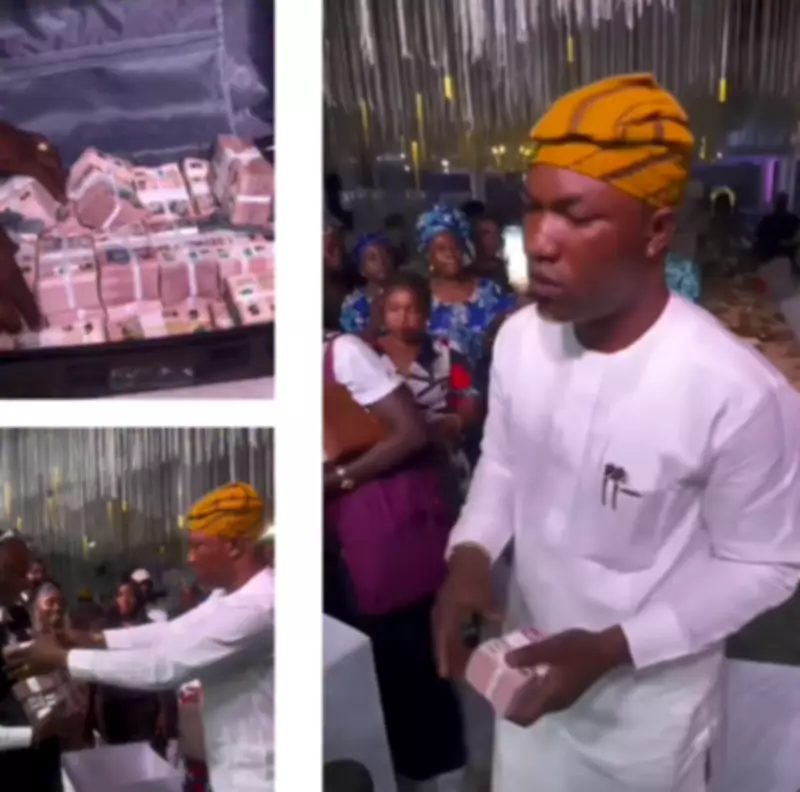Nigerian Man Stuns Wedding Guests by Spraying Couple with Bundles of N5 Bills