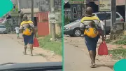 Heartwarming Video of Nigerian Dad Backing Child in Anambra Sparks Online Reactions