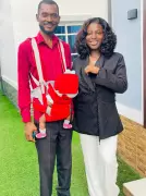 Nigerian Woman Slams Society for Judging Husband Carrying Baby