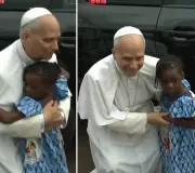 Pope Leo XIV's Heartwarming Embrace of Young Girl in Cameroon Goes Viral