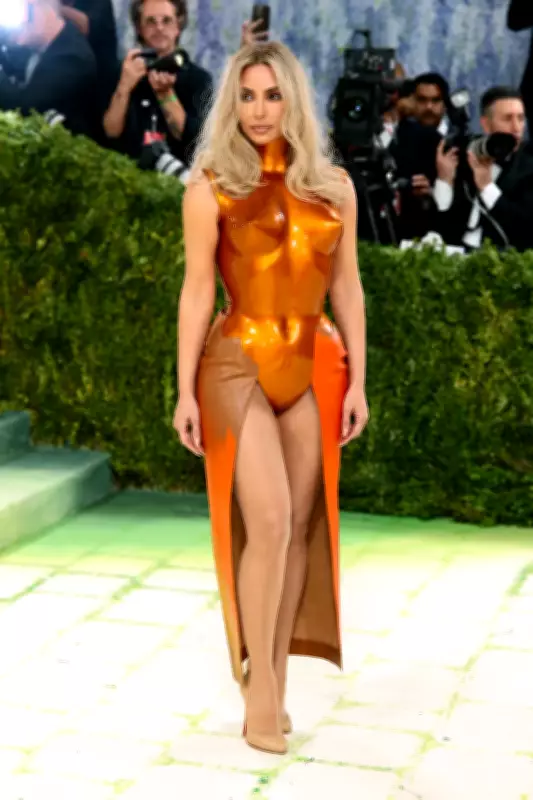 Kim Kardashian Turns Heads at 2026 Met Gala in Custom Orange Breastplate