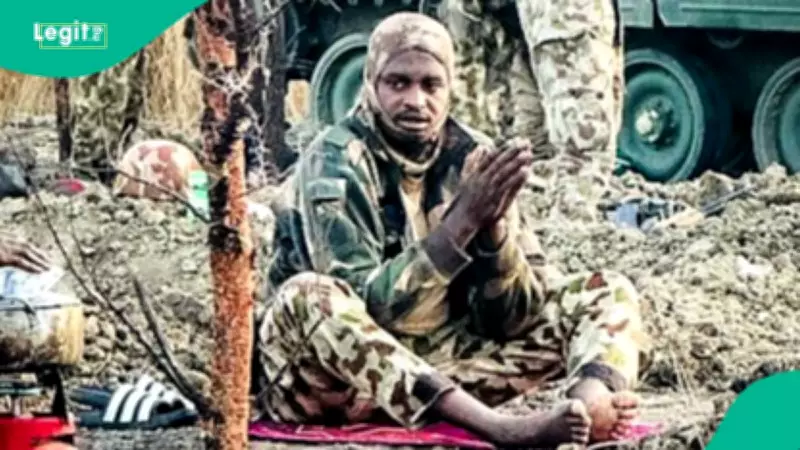 Nigeria Eid: DHQ Releases Photo of Soldiers Praying on Battlefield