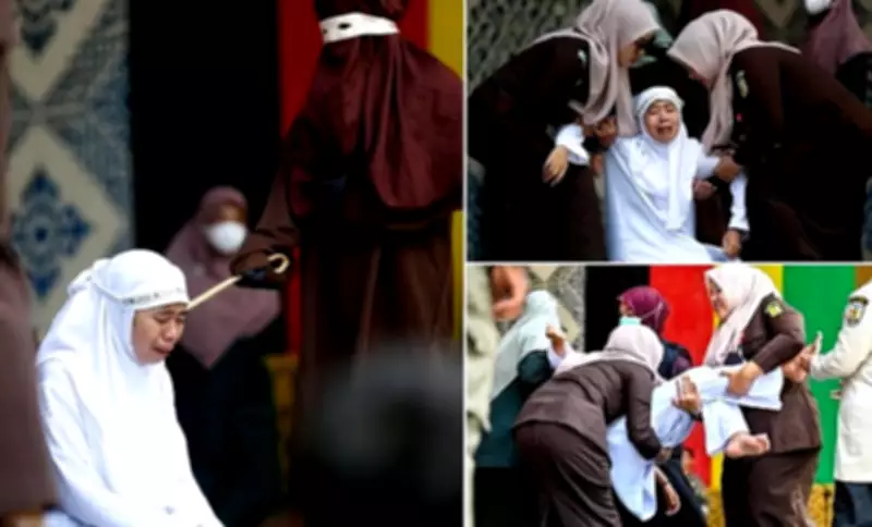 Woman Faints After 100 Lashes for Sex Outside Marriage Under Sharia Law in Indonesia