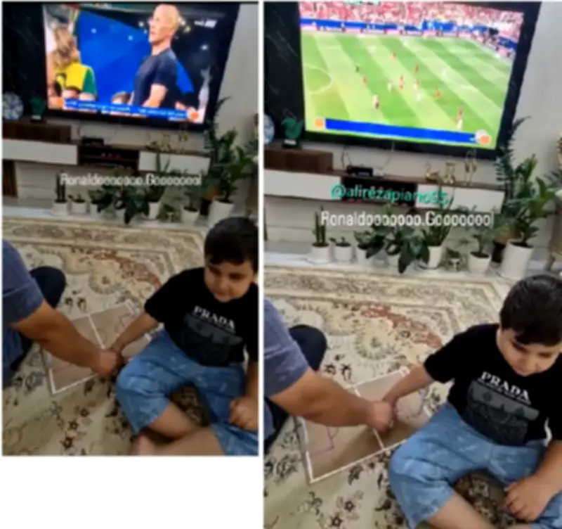 Father helps visually impaired son 'watch' Portugal match with tactile football board