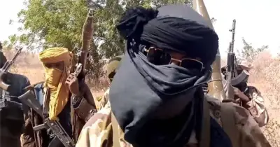 Viral Video of Armed Bandits Passing Police Sparks Outrage in Nigeria