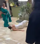Bride Falls Face-First at Wedding While Dancing to Chris Brown Song