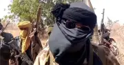 Viral Video of Armed Bandits Passing Police Sparks Outrage in Nigeria