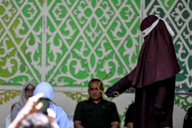 Couple flogged in Indonesia for kissing during TikTok Live video